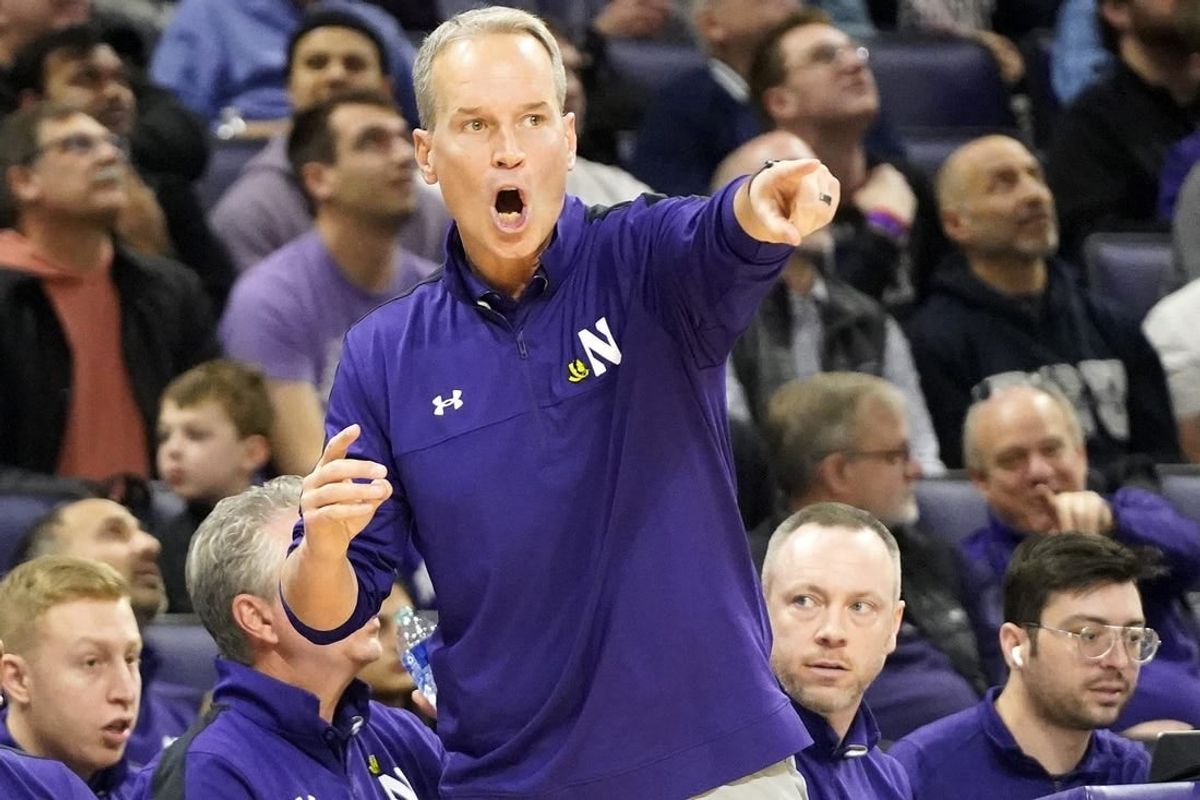 Feb 11, 2024; Evanston, Illinois, USA; Northwestern Wildcats head coach Chris Collins gestures to his team during the first half at Welsh-Ryan Arena.
