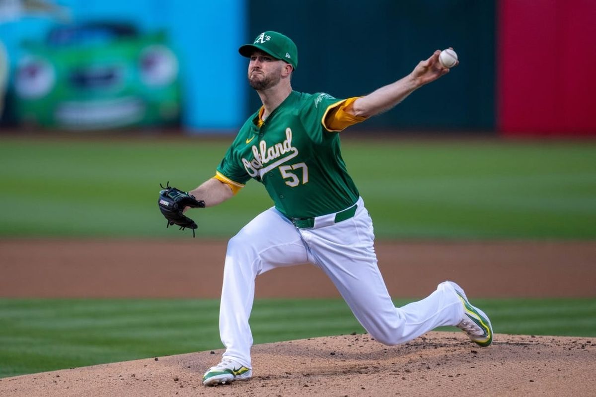 Apr 30, 2024; Oakland, California, USA;  Oakland Athletics pitcher Alex Wood (57) delivers a pitch against the Pittsburgh Pirates during the first inning at Oakland-Alameda County Coliseum.