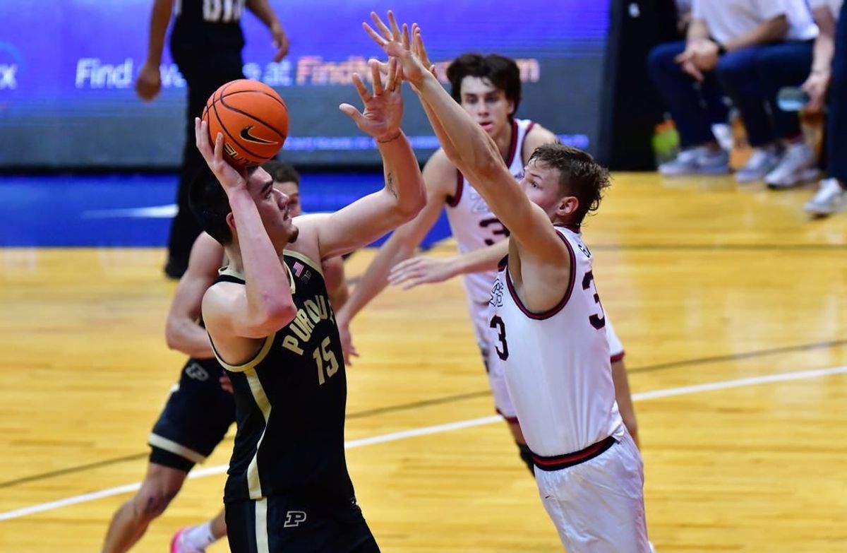 Nov 20, 2023; Honolulu, Hawaii, USA;  Purdue Boilermakers center Zach Edey (15) shoots while being defended by Gonzaga Bulldogs forward Ben Gregg (33) during the first half at SimpliFi Arena at Stan Sheriff Center.