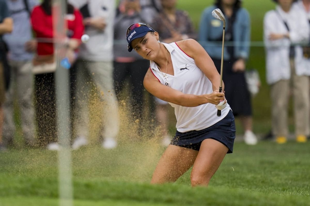 Aug 25, 2023; Vancouver, British Columbia, CAN; Lexi Thompson hits out of the bunker on the eighth hole during the second round of the CPKC Women's Open golf tournament at Shaughnessy Golf & Country Club.