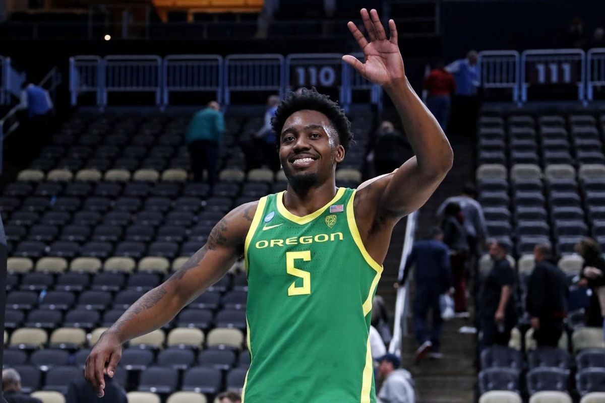 Mar 21, 2024; Pittsburgh, PA, USA; Oregon Ducks guard Jermaine Couisnard (5) waves as he walks off the court after the Oregon Ducks beat the South Carolina Gamecocks in the first round of the 2024 NCAA Tournament at PPG Paints Arena.