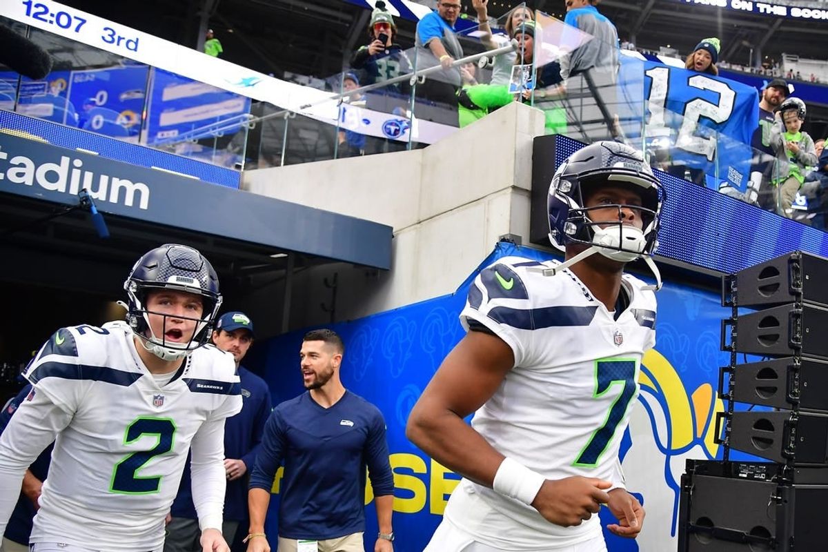 Dec 4, 2022; Inglewood, California, USA; Seattle Seahawks quarterback Geno Smith (7) and quarterback Drew Lock (2) take the field before playing against the Los Angeles Rams at SoFi Stadium.