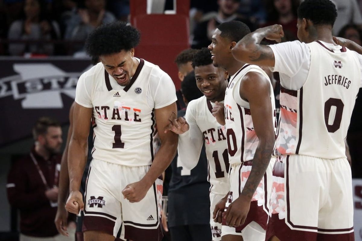 Feb 25, 2023; Starkville, Mississippi, USA; Mississippi State Bulldogs forward Tolu Smith (1) reacts with teammates after a basket during the second half against the Texas A&M Aggies at Humphrey Coliseum.