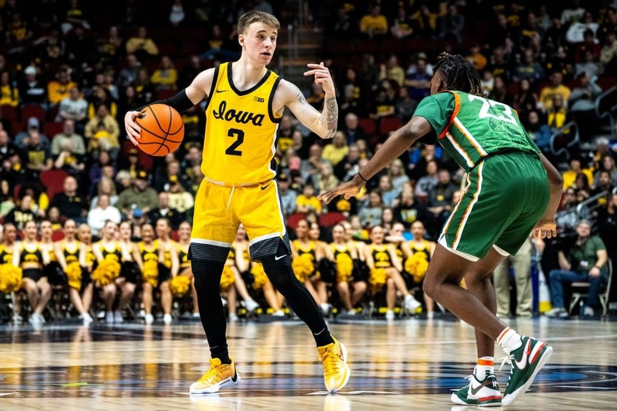 Iowa's Brock Harding directs the offense during the Hawkeye Showcase at Wells Fargo Arena on Saturday, Dec. 16, 2023, in Des Moines.
