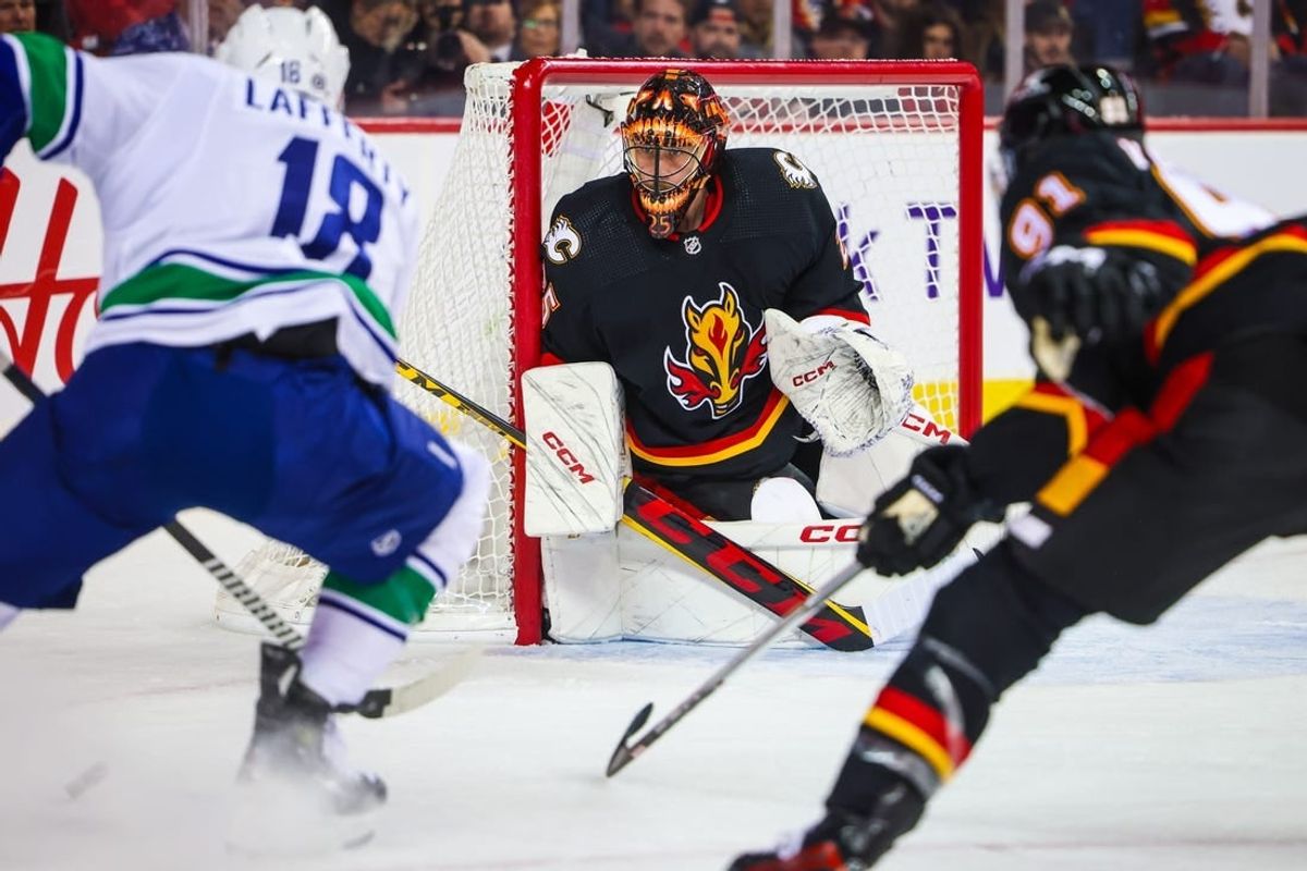 Nov 16, 2023; Calgary, Alberta, CAN; Calgary Flames goaltender Jacob Markstrom (25) guards his net against Vancouver Canuck during the first period at Scotiabank Saddledome.