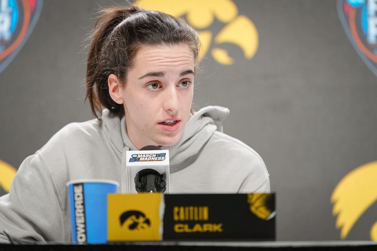 Iowa Hawkeyes guard Caitlin Clark (22) takes questions before practice for the NCAA Women's Final Four championship basketball game at Rocket Mortgage Fieldhouse, Saturday, April 6, 2024 in Cleveland.