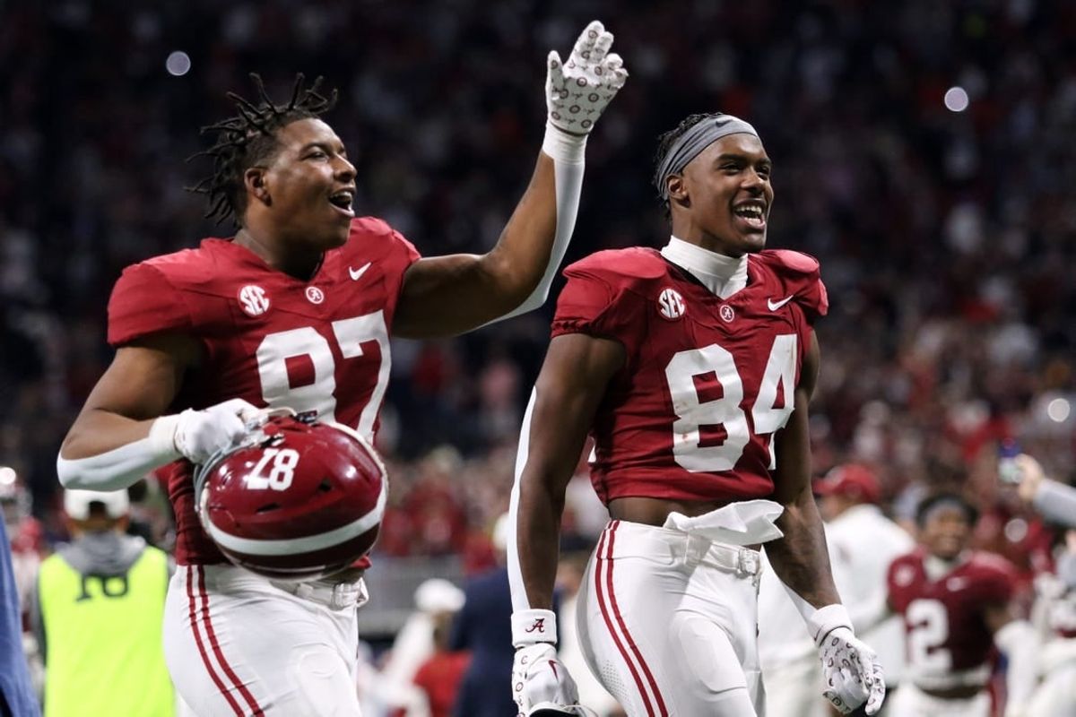 Dec 2, 2023; Atlanta, GA, USA;  Alabama Crimson Tide tight end Amari Niblack (84) and tight end Danny Lewis Jr. (87) celebrate after defeating the Georgia Bulldogs in the SEC championship game at Mercedes-Benz Stadium.