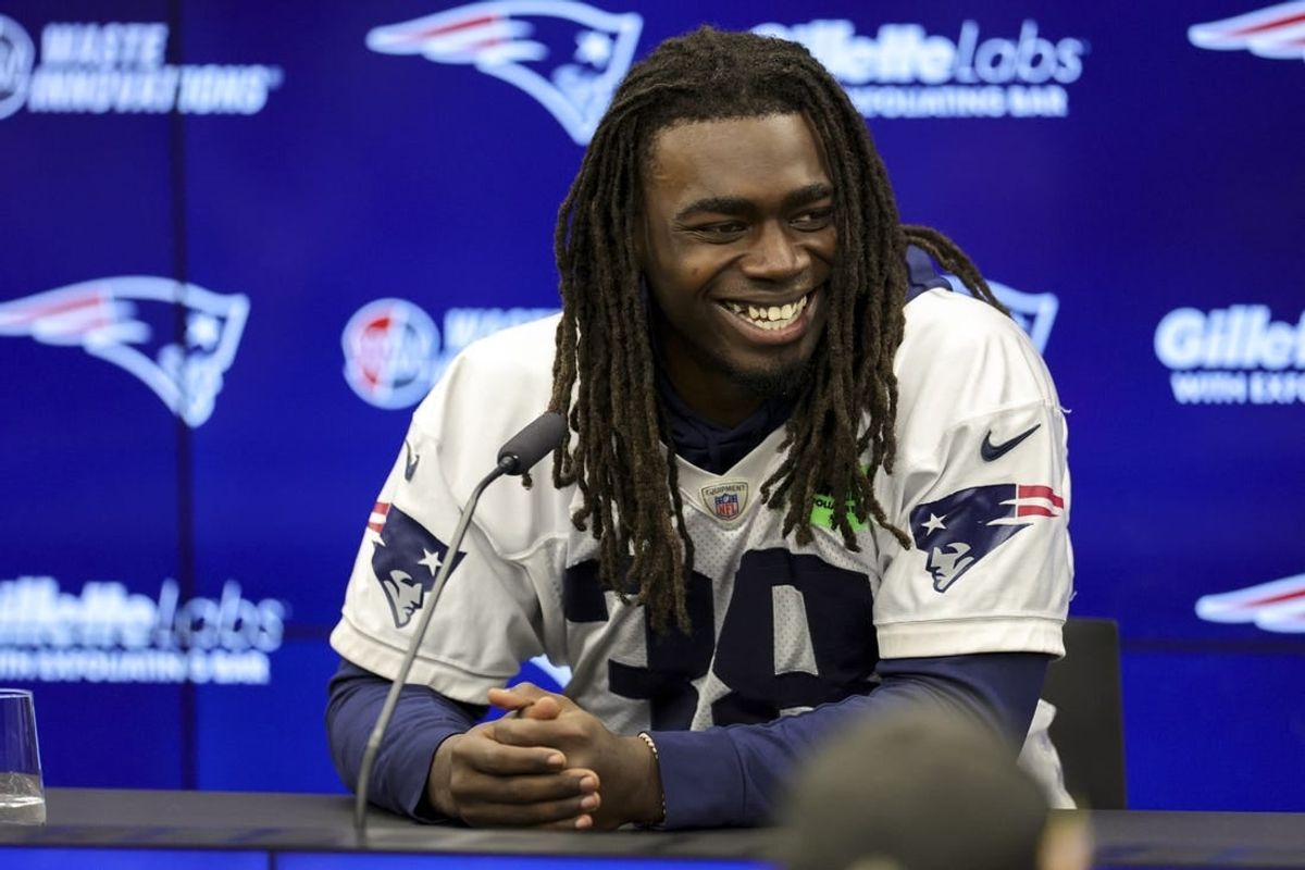 Nov 10, 2023; Frankfurt, Germany;  New England Patriots running back Rhamondre Stevenson (38) speaks to the media before an NFL International Series practice at the Deutcher Fussball-Bund facility.