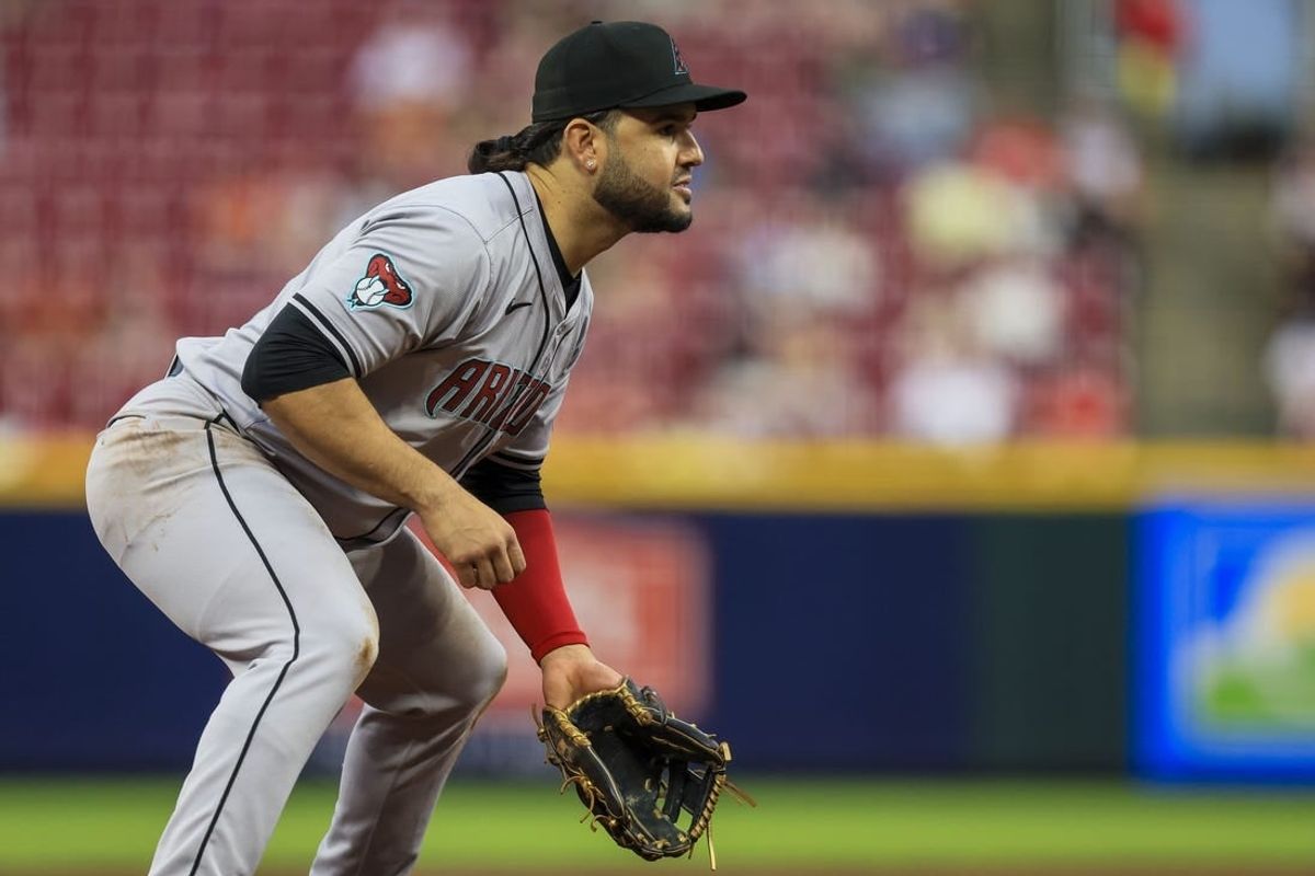 May 8, 2024; Cincinnati, Ohio, USA; Arizona Diamondbacks third baseman Eugenio Suarez (28) prepares for the pitch in the third inning against the Cincinnati Reds at Great American Ball Park.