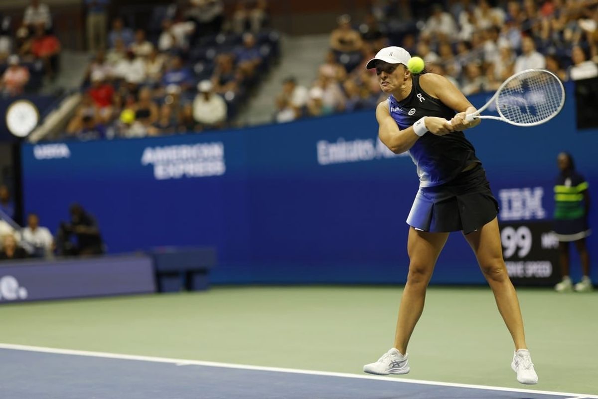 Sep 3, 2023; Flushing, NY, USA; Iga Swiatek of Poland hits a backhand against Jelena Ostapenko of Latvia (not pictured) on day seven of the 2023 U.S. Open tennis tournament at USTA Billie Jean King National Tennis Center.