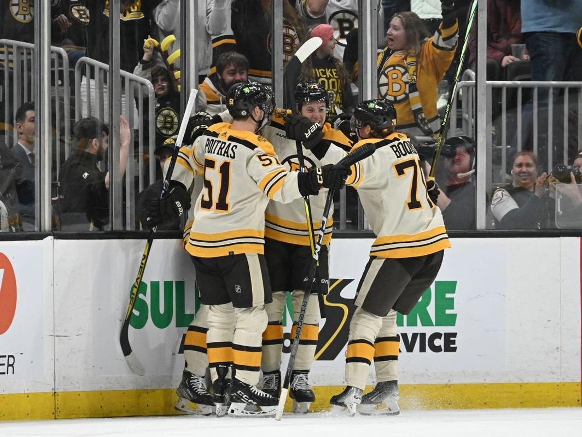 Jan 20, 2024; Boston, Massachusetts, USA; Boston Bruins left wing Danton Heinen (43) celebrates with his teammates after a goal against the Montreal Canadiens during the second period at the TD Garden.