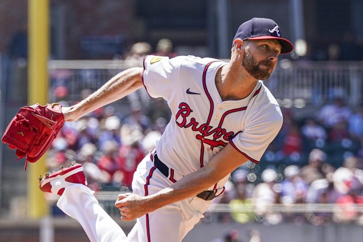 Apr 7, 2024; Cumberland, Georgia, USA; Atlanta Braves starting pitcher Chris Sale (51) pitches against the Arizona Diamondbacks during the first inning at Truist Park.
