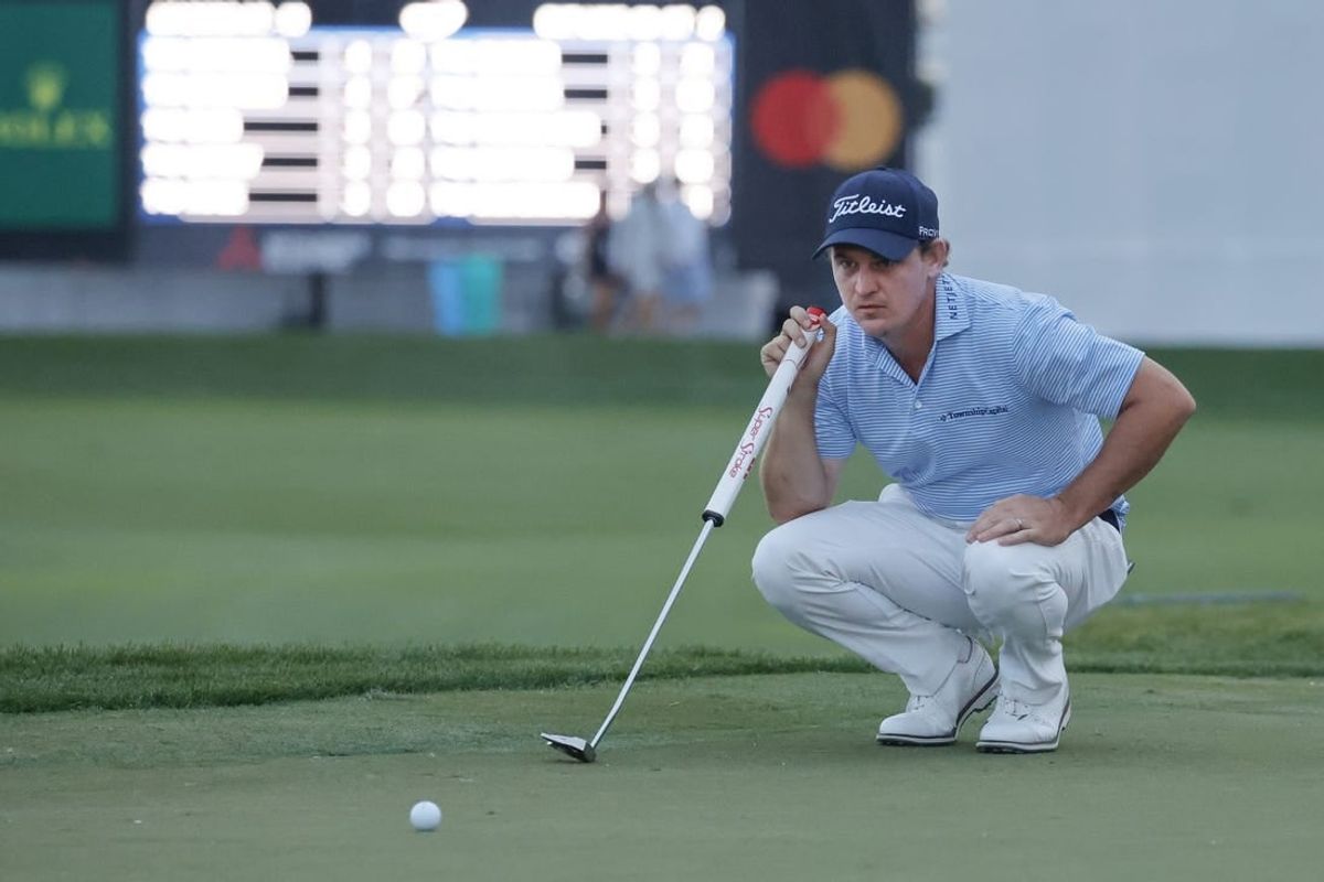Mar 1, 2024; Palm Beach Gardens, Florida, USA; Bud Cauley lines up his putt on the 18th green during the second round of the Cognizant Classic in The Palm Beaches golf tournament.