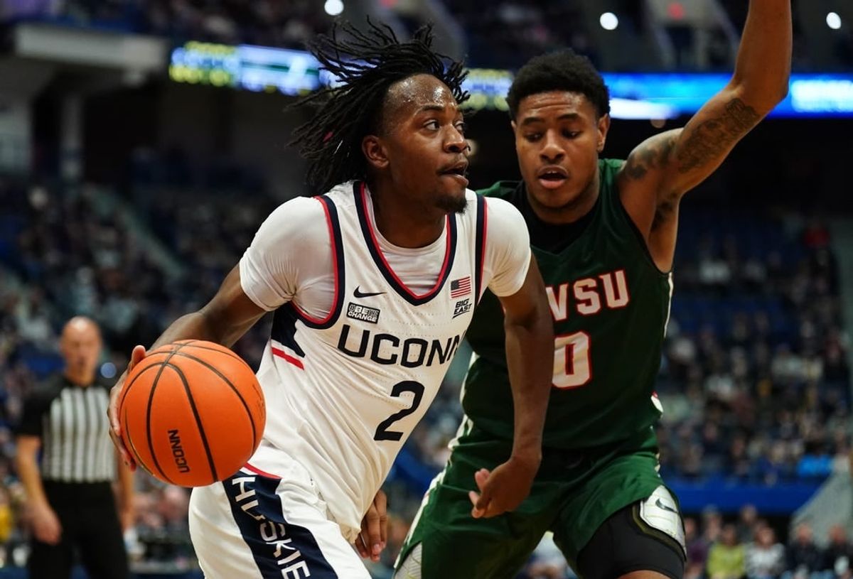 Nov 14, 2023; Hartford, Connecticut, USA; UConn Huskies guard Tristen Newton (2) drives the ball against Mississippi Valley State Delta Devils guard Rayquan Brown (0) in the first half at XL Center.