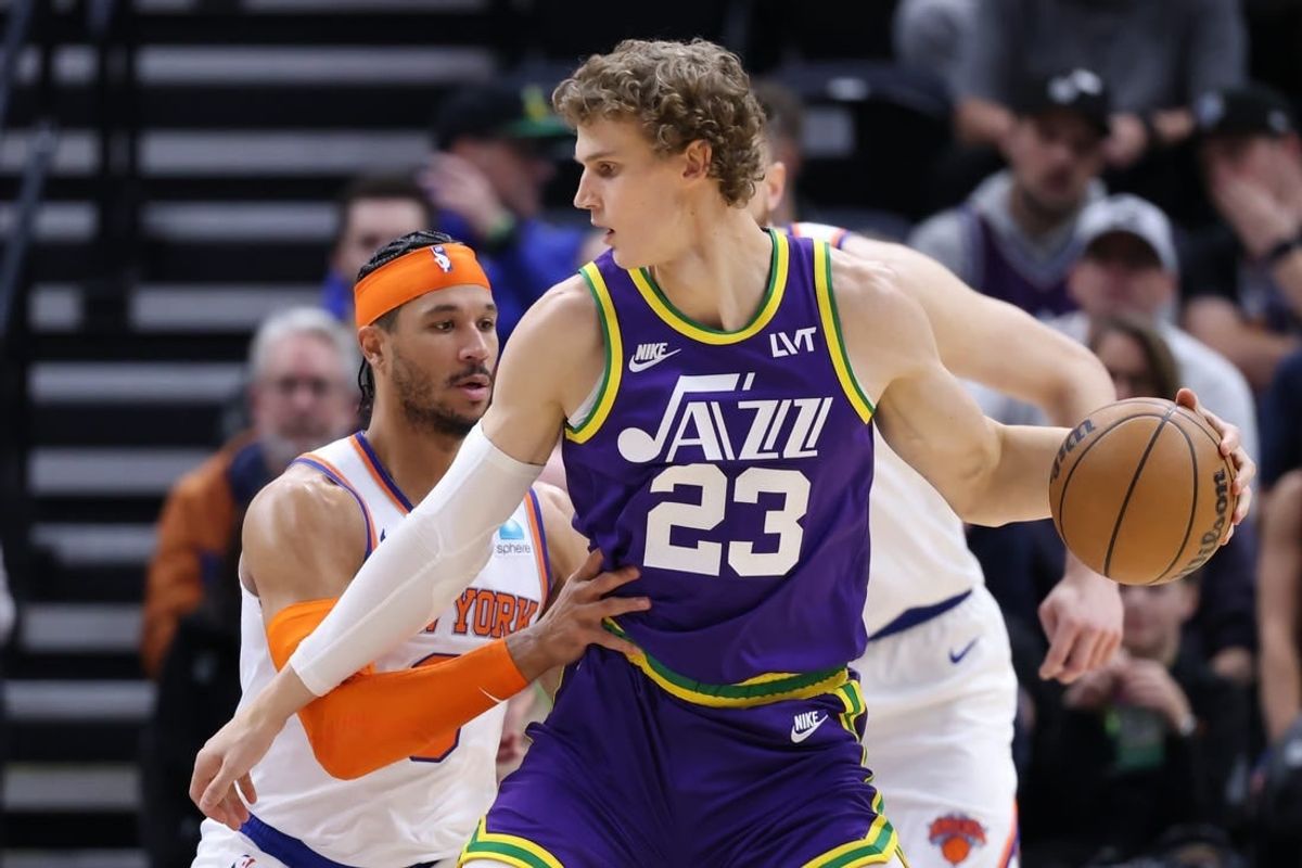 Dec 13, 2023; Salt Lake City, Utah, USA; Utah Jazz forward Lauri Markkanen (23) posts up against New York Knicks guard Josh Hart (3) during the second quarter at Delta Center.