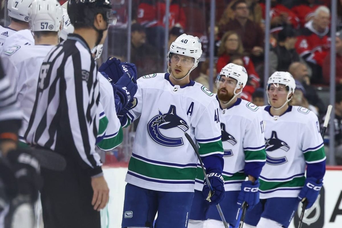 Jan 6, 2024; Newark, New Jersey, USA; Vancouver Canucks center Elias Pettersson (40) celebrates his goal against the New Jersey Devils during the second period at Prudential Center.
