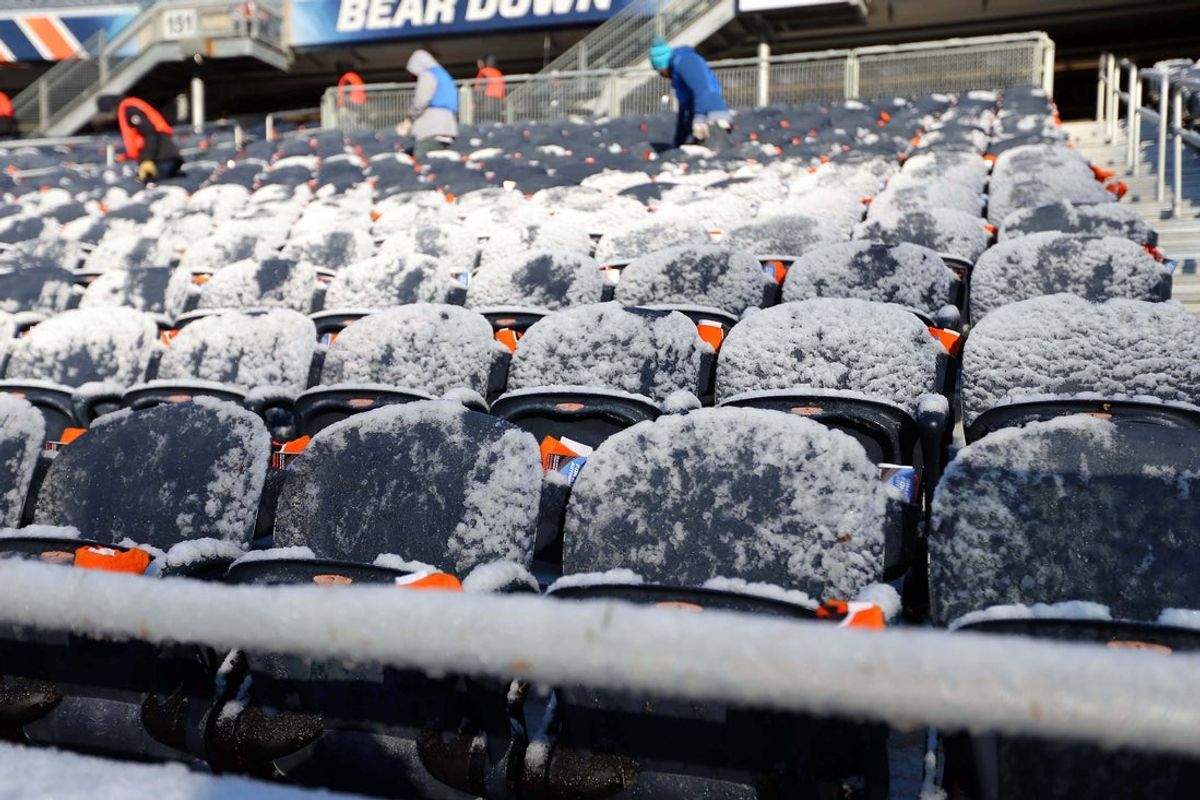 Nov 22, 2015; Chicago, IL, USA; A general view of stadium crew clearing snow prior to a game between the Chicago Bears and the Denver Broncos at Soldier Field. Mandatory Credit: Dennis Wierzbicki-Imagn Images