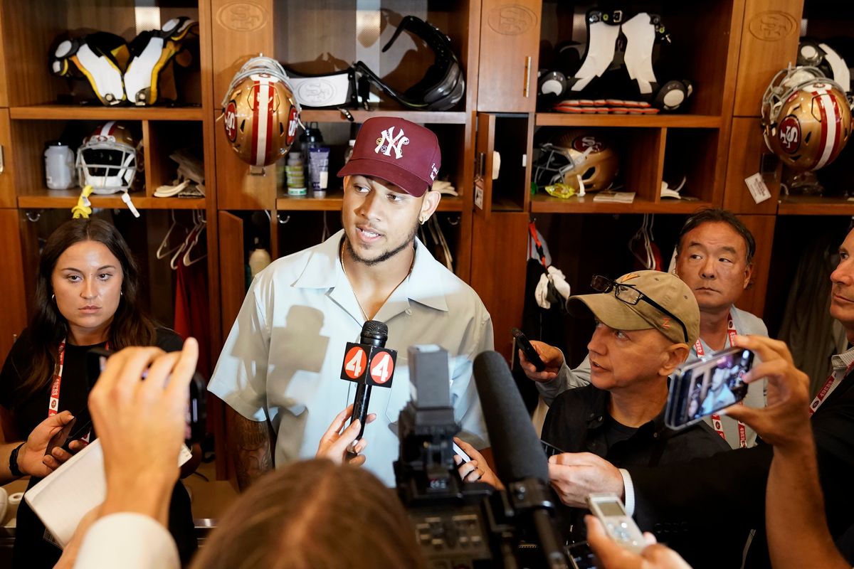 San Francisco 49ers quarterback Trey Lance speaks to reporters