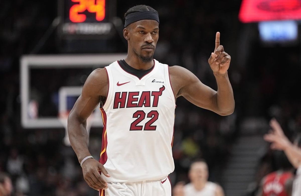 Dec 6, 2023; Toronto, Ontario, CAN; Miami Heat forward Jimmy Butler (22) gestures his bench during the fourth quarter against the Toronto Raptors at Scotiabank Arena.