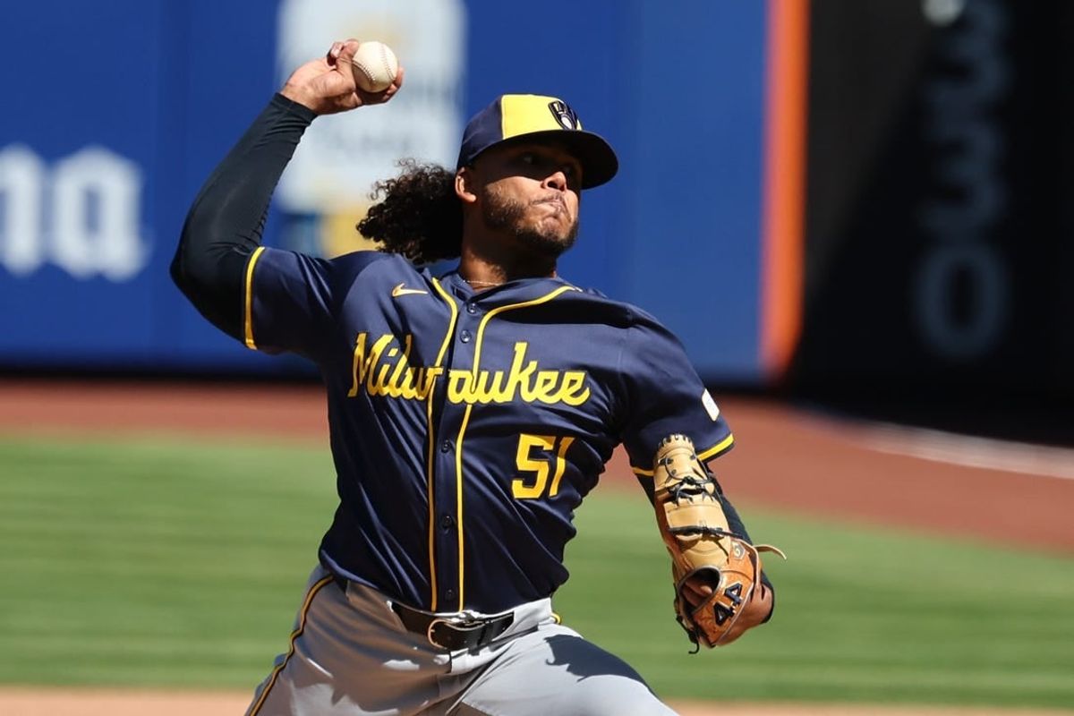 Mar 29, 2024; New York City, New York, USA; Milwaukee Brewers starting pitcher Freddy Peralta (51) delivers a pitch  during the first inning against the New York Mets at Citi Field.
