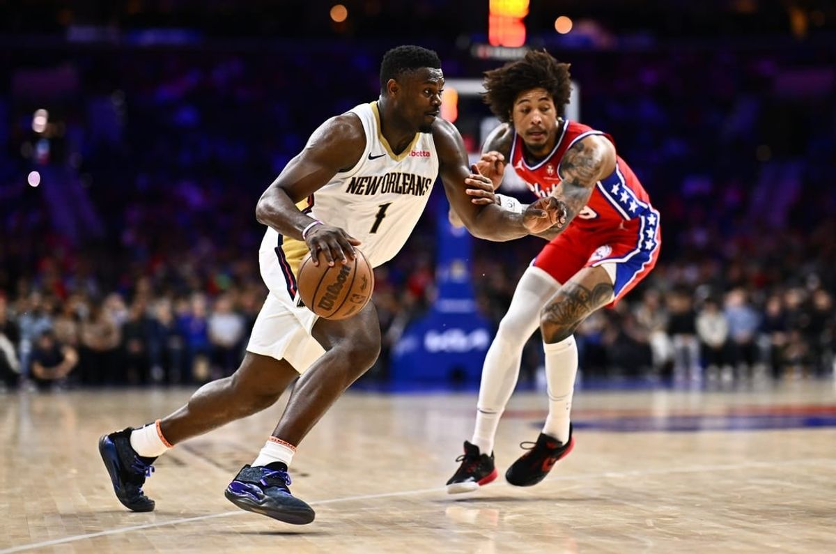 Mar 8, 2024; Philadelphia, Pennsylvania, USA; New Orleans Pelicans forward Zion Williamson (1) drives against Philadelphia 76ers guard Kelly Oubre Jr (9) in the third quarter at Wells Fargo Center.