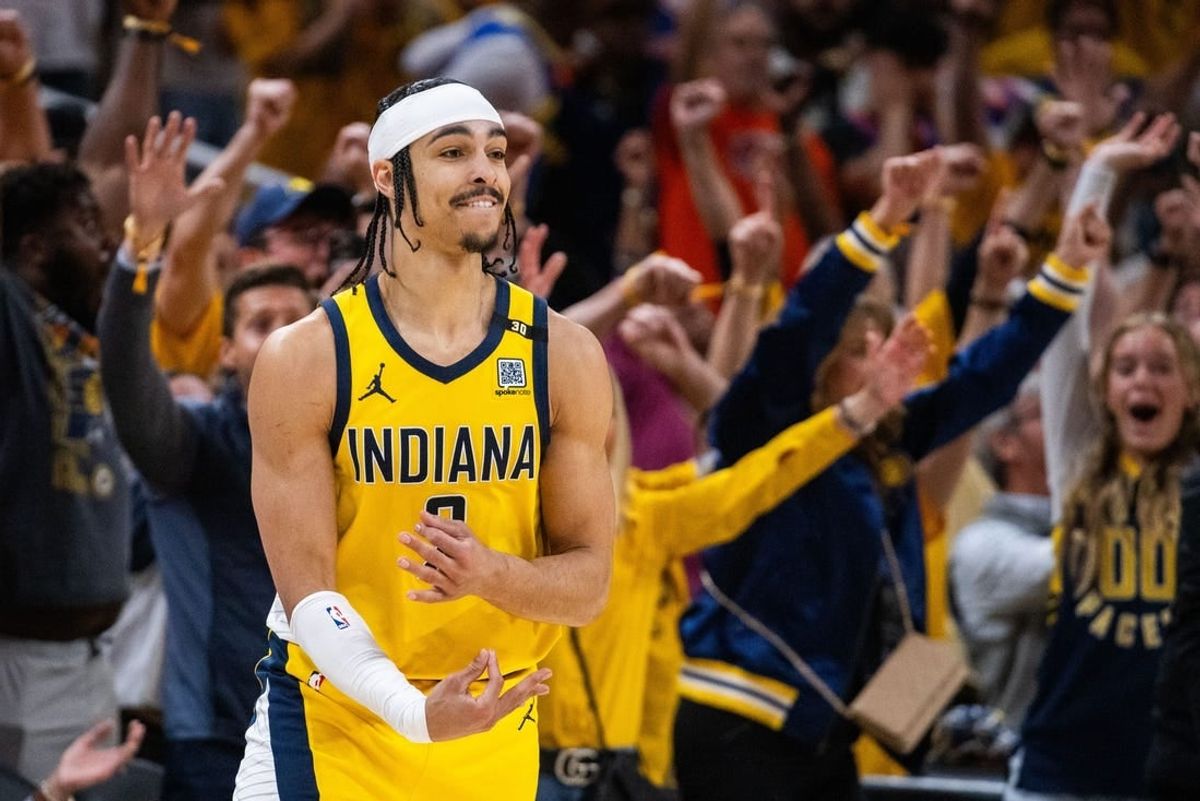 May 10, 2024; Indianapolis, Indiana, USA; Indiana Pacers guard Andrew Nembhard (2) celebrates his game clinching three-point basket during game three of the second round for the 2024 NBA playoffs against the New York Knicks at Gainbridge Fieldhouse.