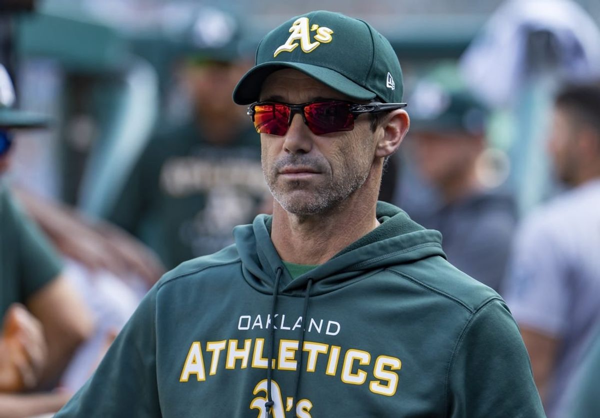 May 10, 2022; Detroit, Michigan, USA; Oakland Athletics bench coach Brad Ausmus (16) looks on from the dugout during the fourth inning against the Detroit Tigers at Comerica Park.
