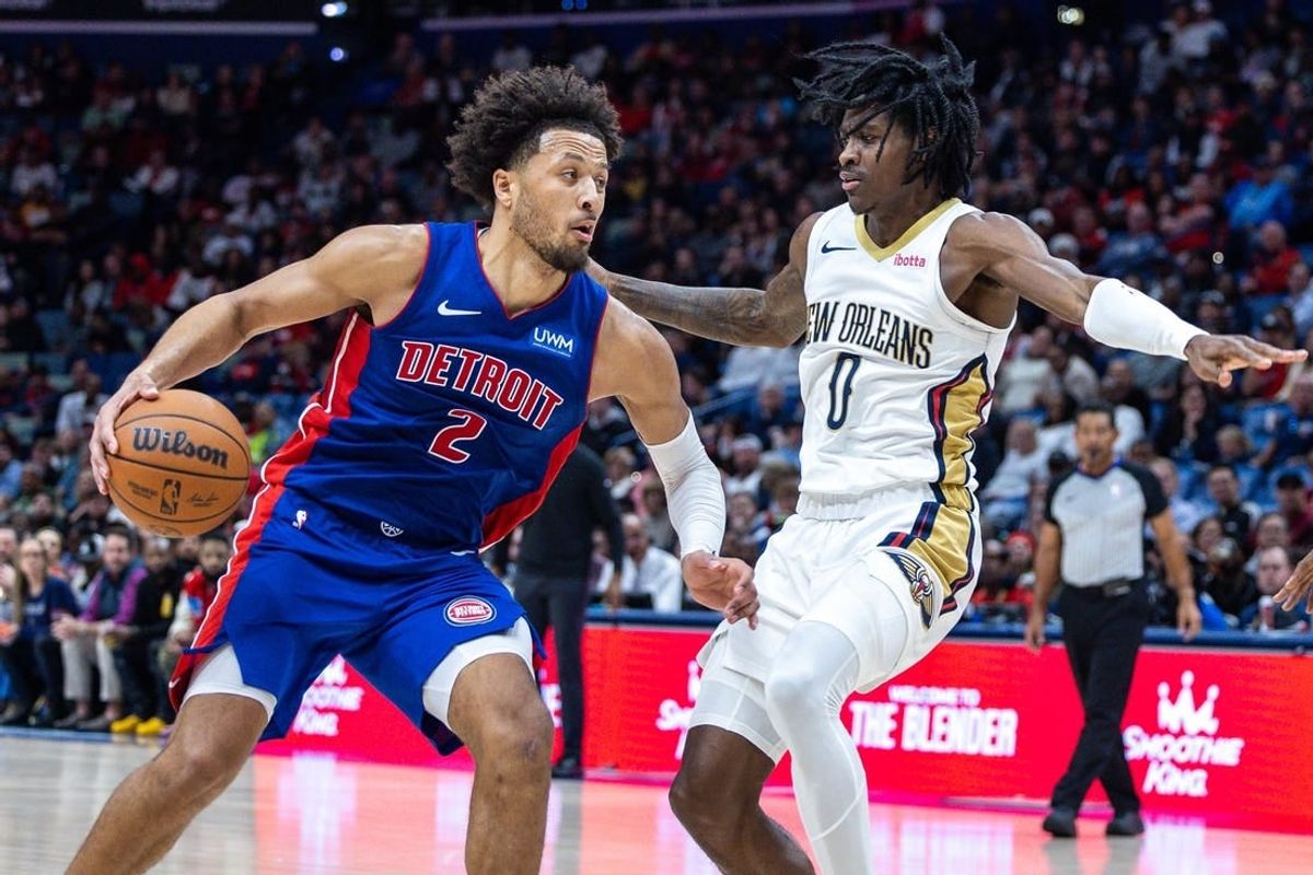 Nov 2, 2023; New Orleans, Louisiana, USA; Detroit Pistons guard Cade Cunningham (2) drives to the basket against New Orleans Pelicans guard Dereon Seabron (0) during the second half at the Smoothie King Center.
