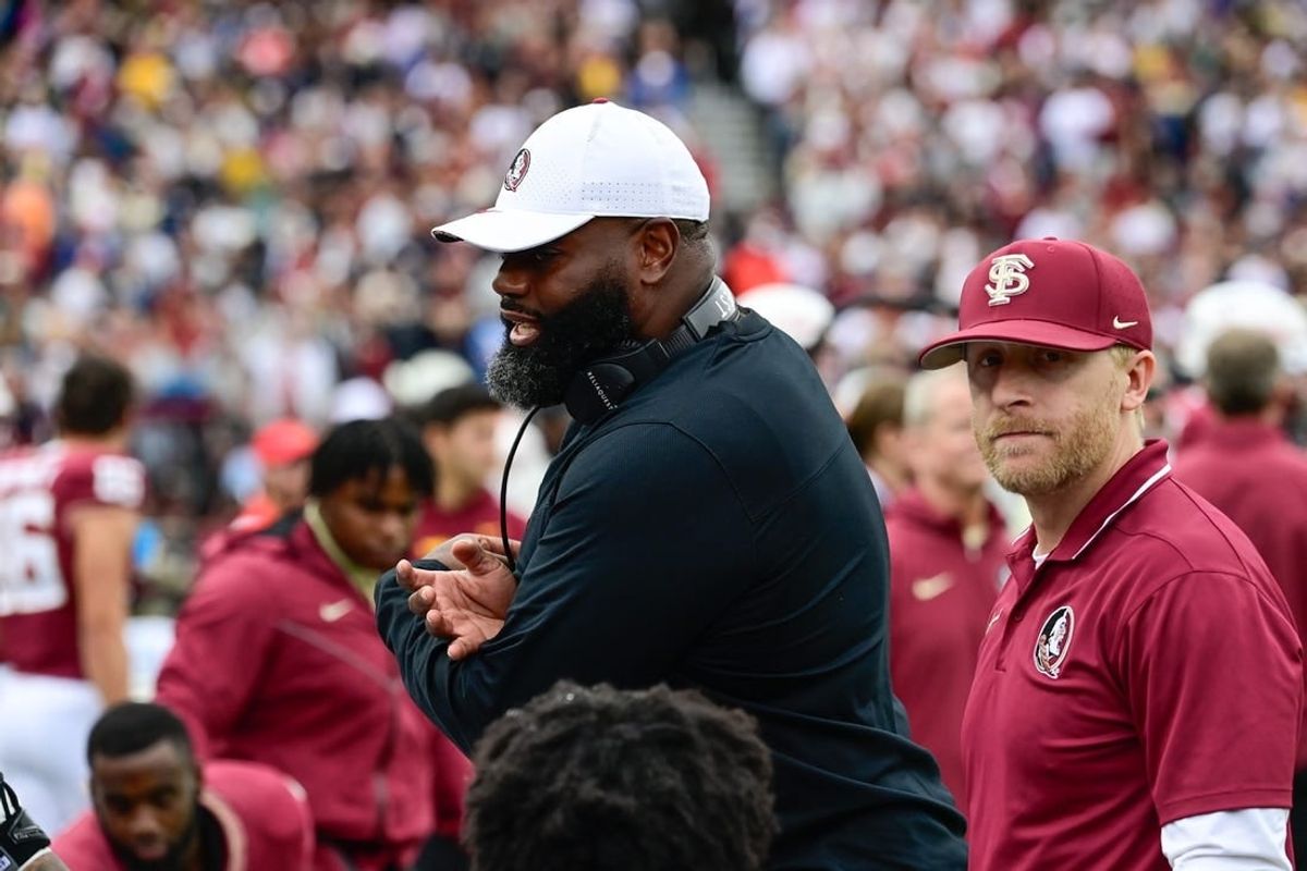 Sep 16, 2023; Chestnut Hill, Massachusetts, USA; Florida State Seminoles offensive coordinator Alex Atkins speaks to the team during the second half against the Boston College Eagles at Alumni Stadium.