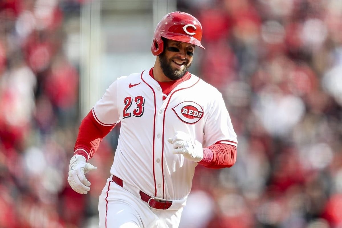Mar 28, 2024; Cincinnati, Ohio, USA; Cincinnati Reds designated hitter Nick Martini (23) runs the bases after hitting a two-run home run in the second inning against the Washington Nationals at Great American Ball Park.