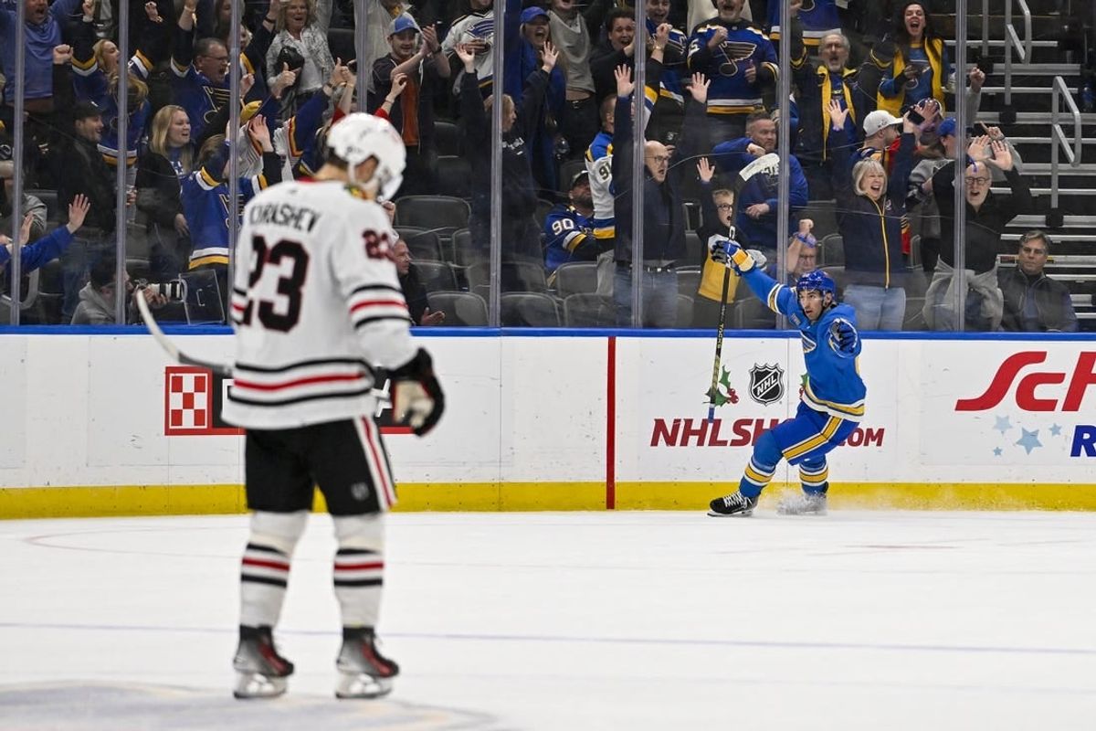 Dec 23, 2023; St. Louis, Missouri, USA;  St. Louis Blues center Jordan Kyrou (25) reacts after scoring against the Chicago Blackhawks during the third period at Enterprise Center.