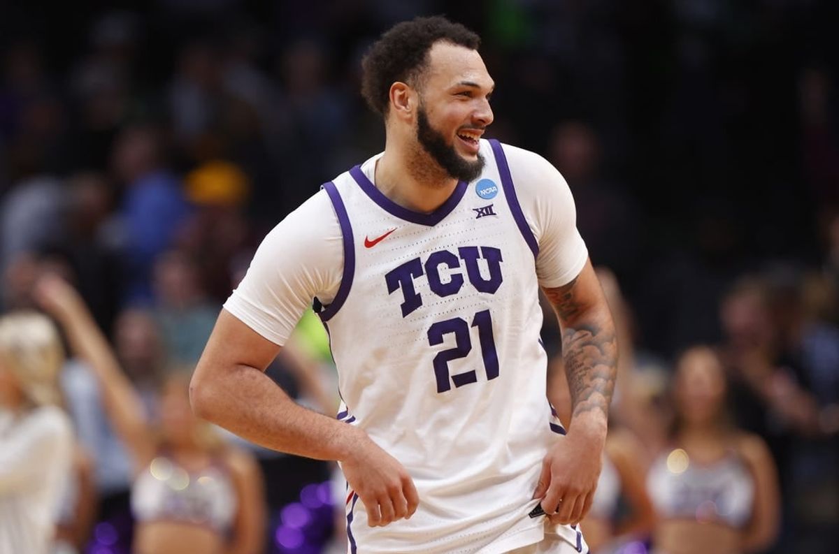 Mar 17, 2023; Denver, CO, USA; TCU Horned Frogs forward JaKobe Coles (21) reacts after defeating the Arizona State Sun Devils in the first round of the NCAA tournament at Ball Arena.