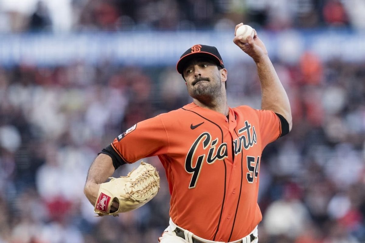 Aug 11, 2023; San Francisco, California, USA;  San Francisco Giants starting pitcher Scott Alexander (54) throws against the Texas Rangers during the first inning at Oracle Park.
