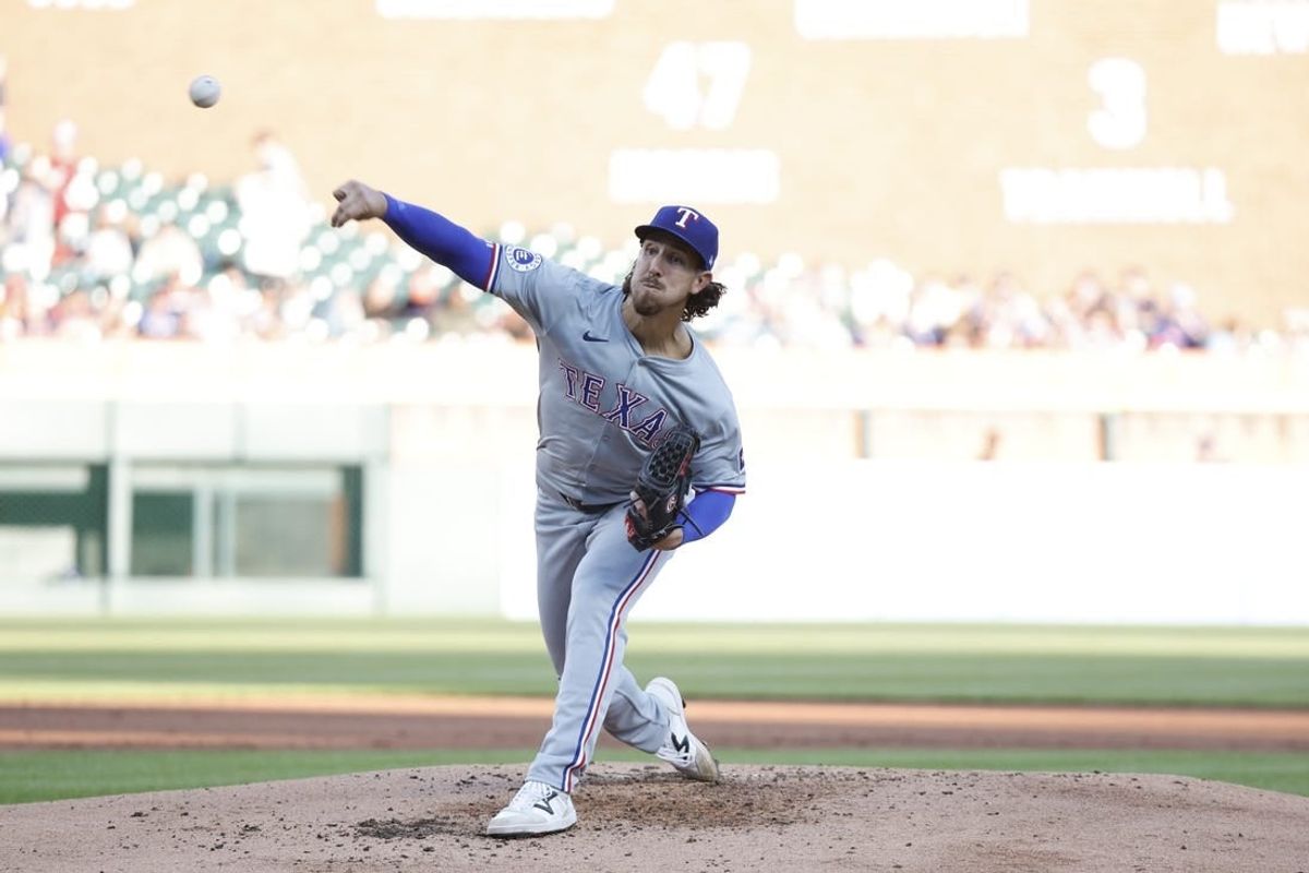 Apr 15, 2024; Detroit, Michigan, USA; Texas Rangers starting pitcher Michael Lorenzen pitches against the Detroit Tigers at Comerica Park.