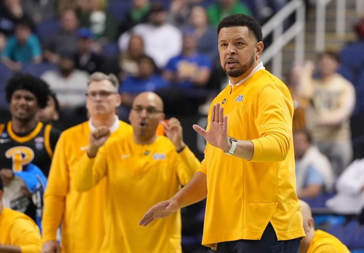 Mar 17, 2023; Greensboro, NC, USA; Pittsburgh Panthers head coach Jeff Capel III (right) gestures during the second half against the Iowa State Cyclones at Greensboro Coliseum.