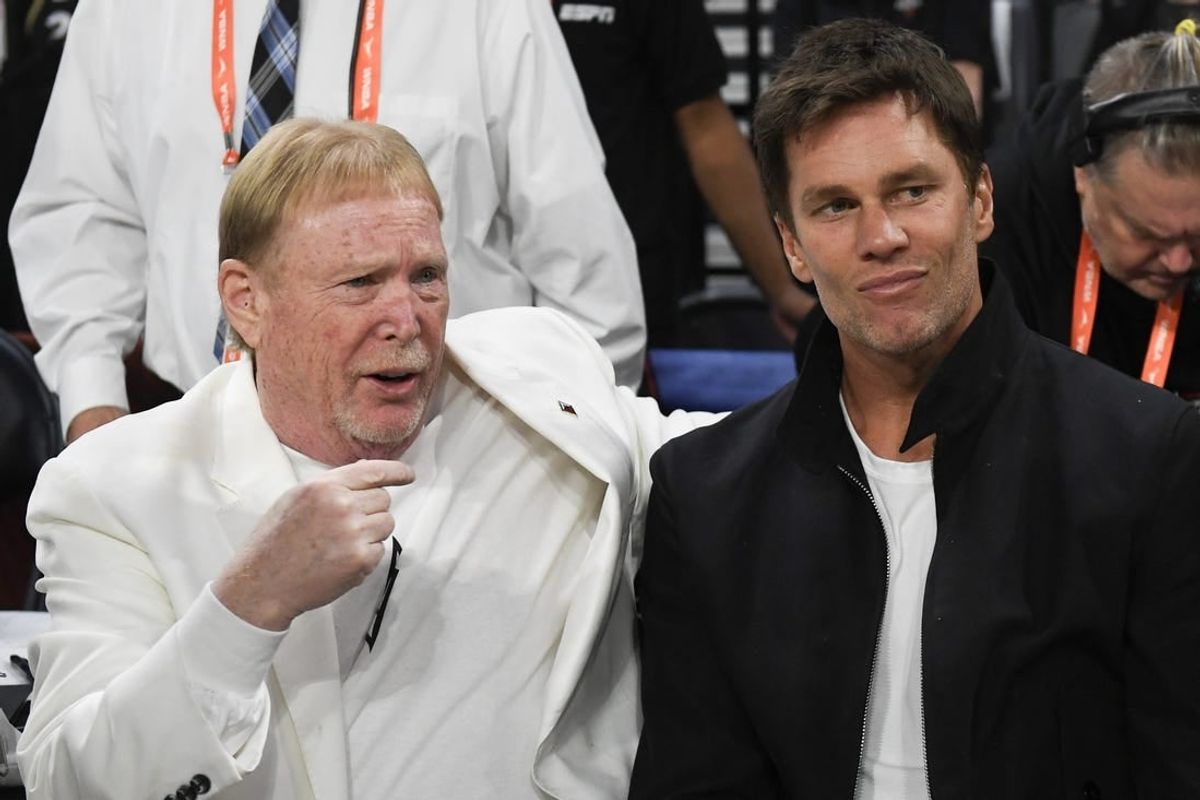 Oct 8, 2023; Las Vegas, Nevada, USA; Las Vegas Aces owner Mark Davis and part-owner Tom Brady talk before the game between the Las Vegas Aces and the New York Liberty during game one of the 2023 WNBA Finals at Michelob Ultra Arena.