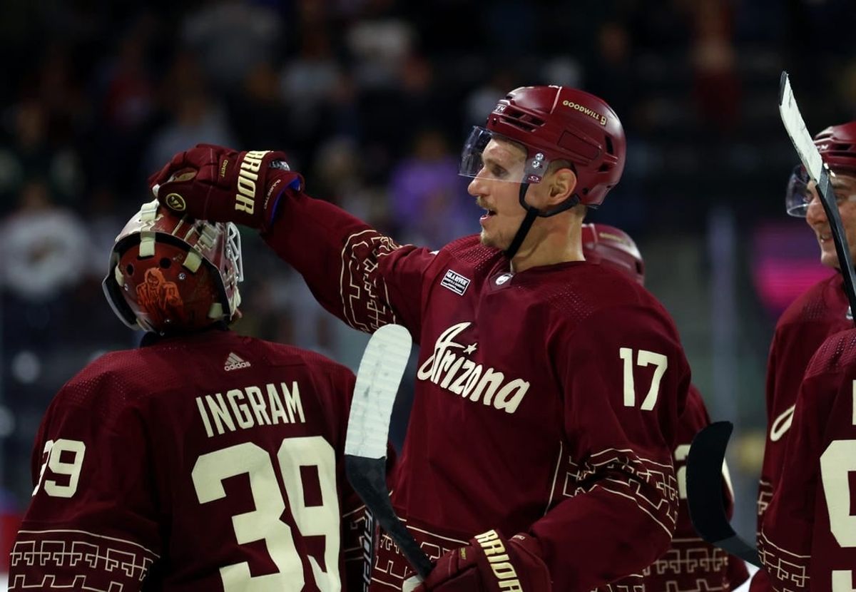 Nov 30, 2023; Tempe, Arizona, USA; Arizona Coyotes center Nick Bjugstad (17) celebrates with goalie Connor Ingram (39) after scoring the winning goal against the Colorado Avalanche in overtime at Mullett Arena.