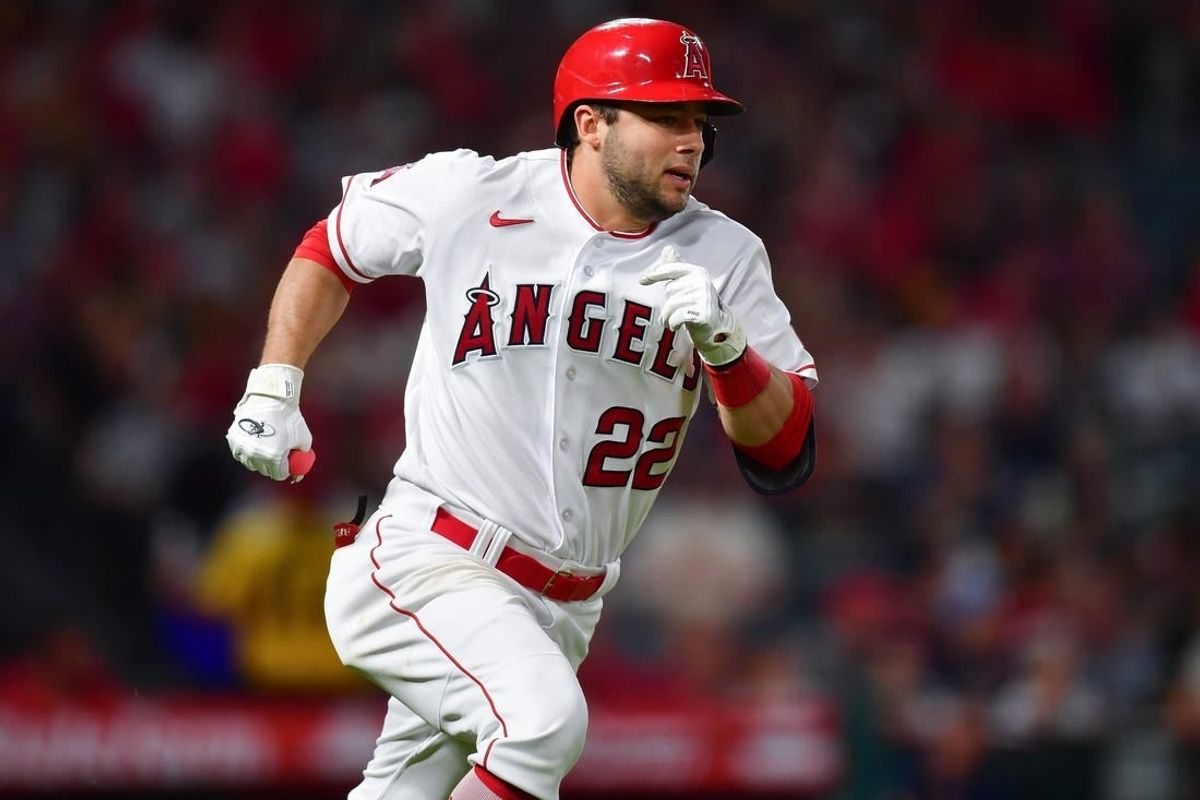 Sep 26, 2023; Anaheim, California, USA; Los Angeles Angels second baseman David Fletcher (22) runs after hitting a single against the Texas Rangers during the fifth inning at Angel Stadium.