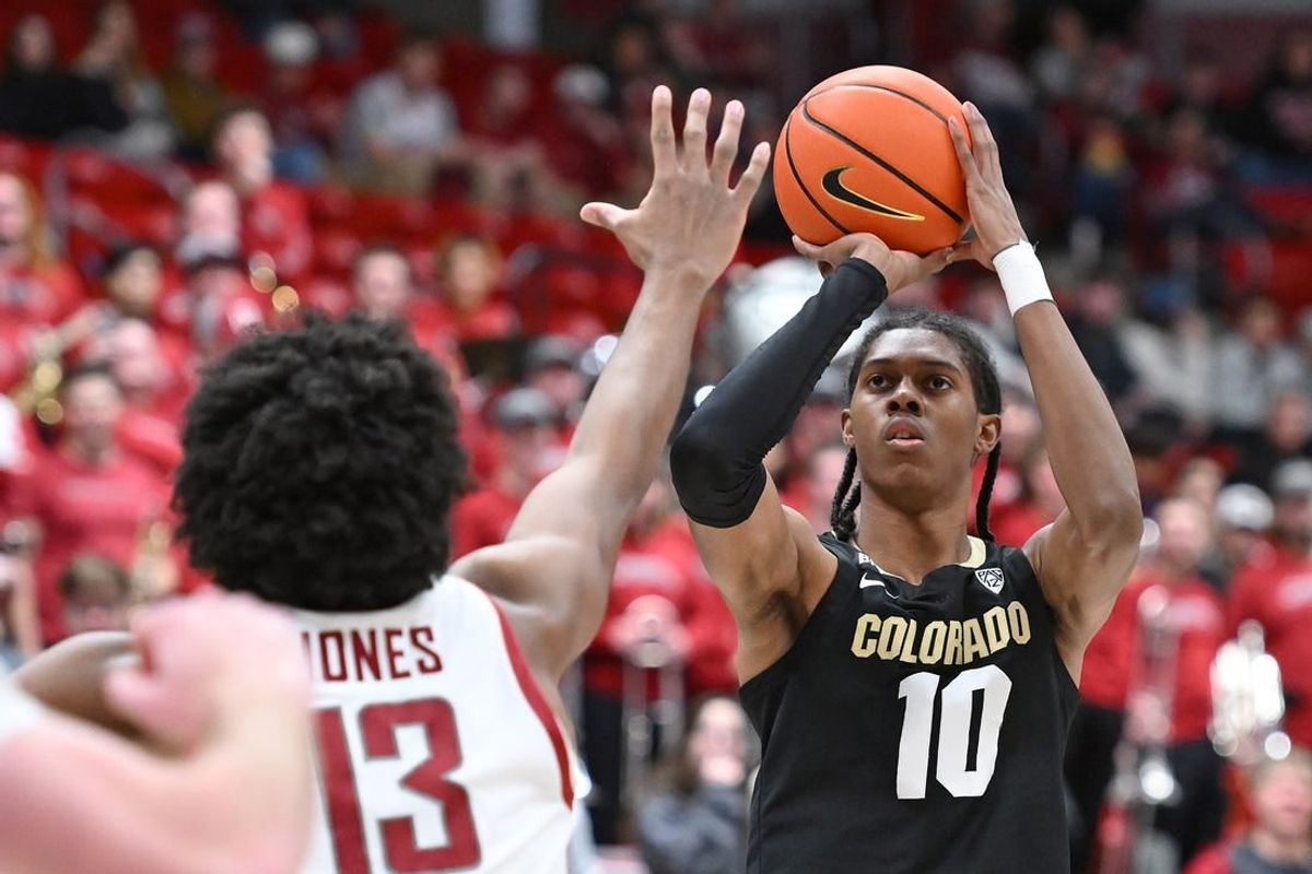 Jan 27, 2024; Pullman, Washington, USA; Colorado Buffaloes forward Cody Williams (10) shoots the ball against Washington State Cougars forward Isaac Jones (13) in the first half at Friel Court at Beasley Coliseum.