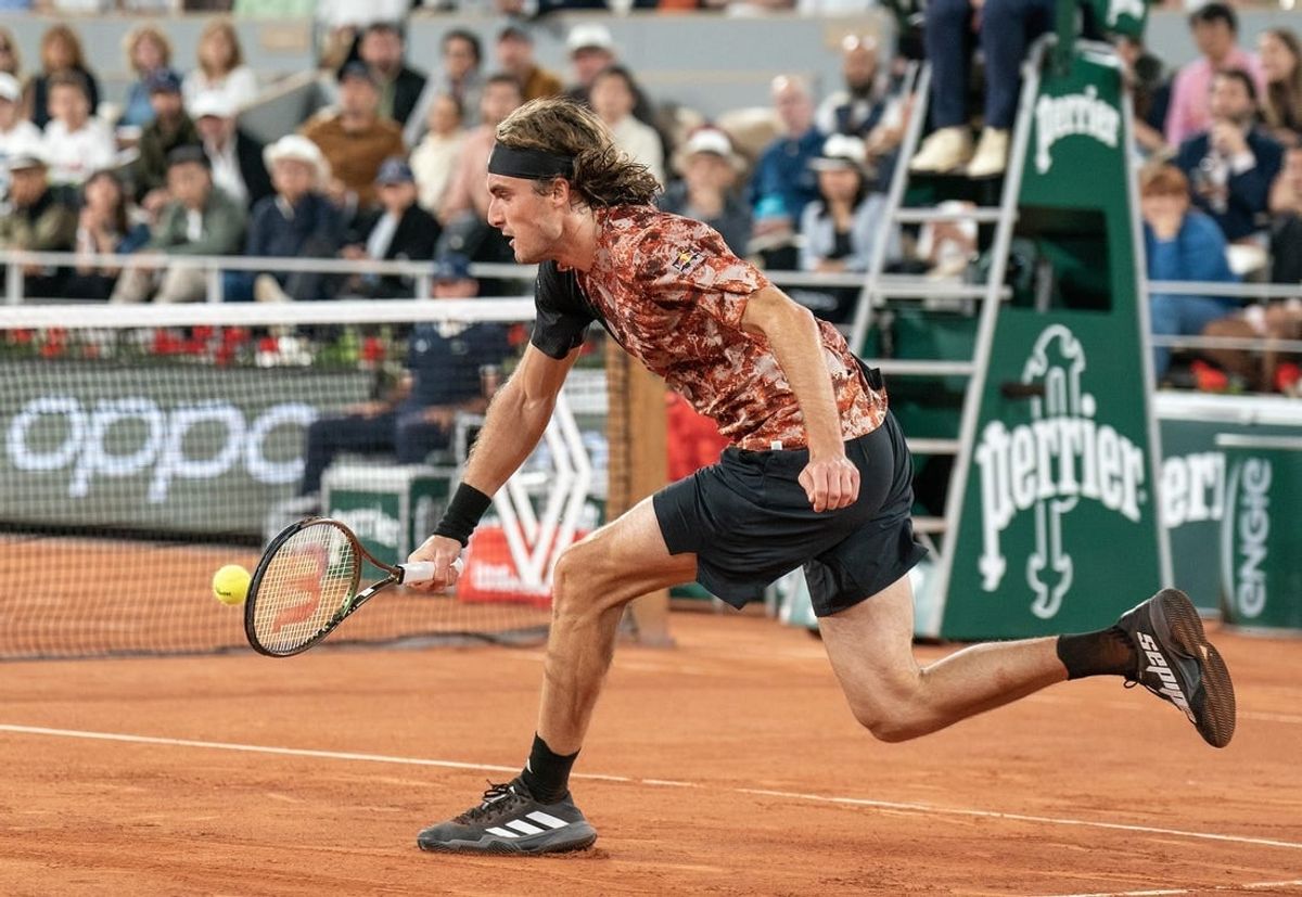 Jun 6 2023; Paris, France; Stefanos Tsitsipas (GRE) returns a shot against Carlos Alcaraz (ESP) on day 10 at Stade Roland-Garros.