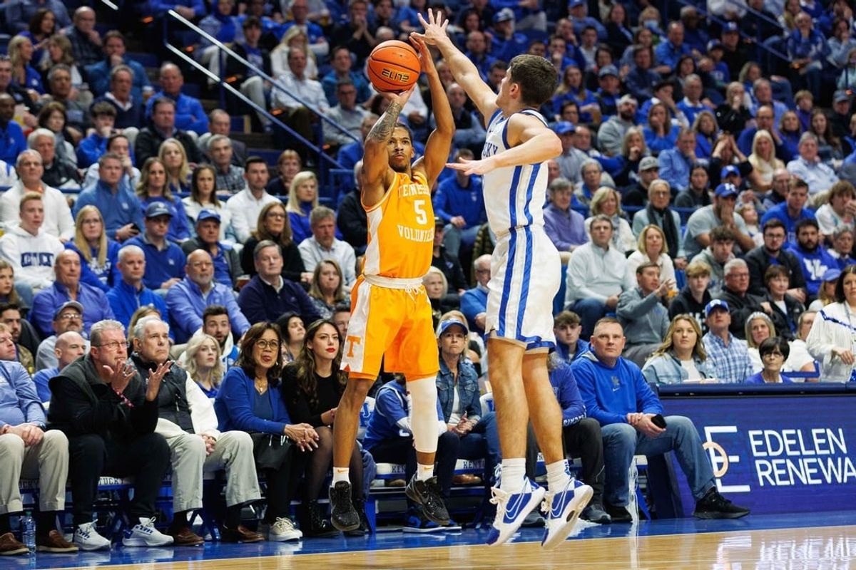 Feb 3, 2024; Lexington, Kentucky, USA; Tennessee Volunteers guard Zakai Zeigler (5) makes a three point basket during the first half against the Kentucky Wildcats at Rupp Arena at Central Bank Center.
