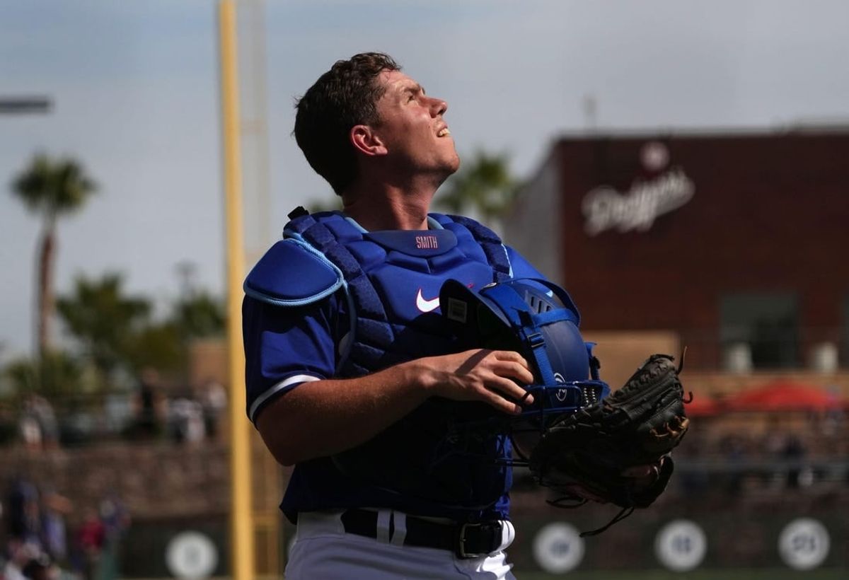 Feb 25, 2024; Phoenix, Arizona, USA; Los Angeles Dodgers catcher Will Smith (16) looks on against the Oakland Athletics during the second inning at Camelback Ranch-Glendale.