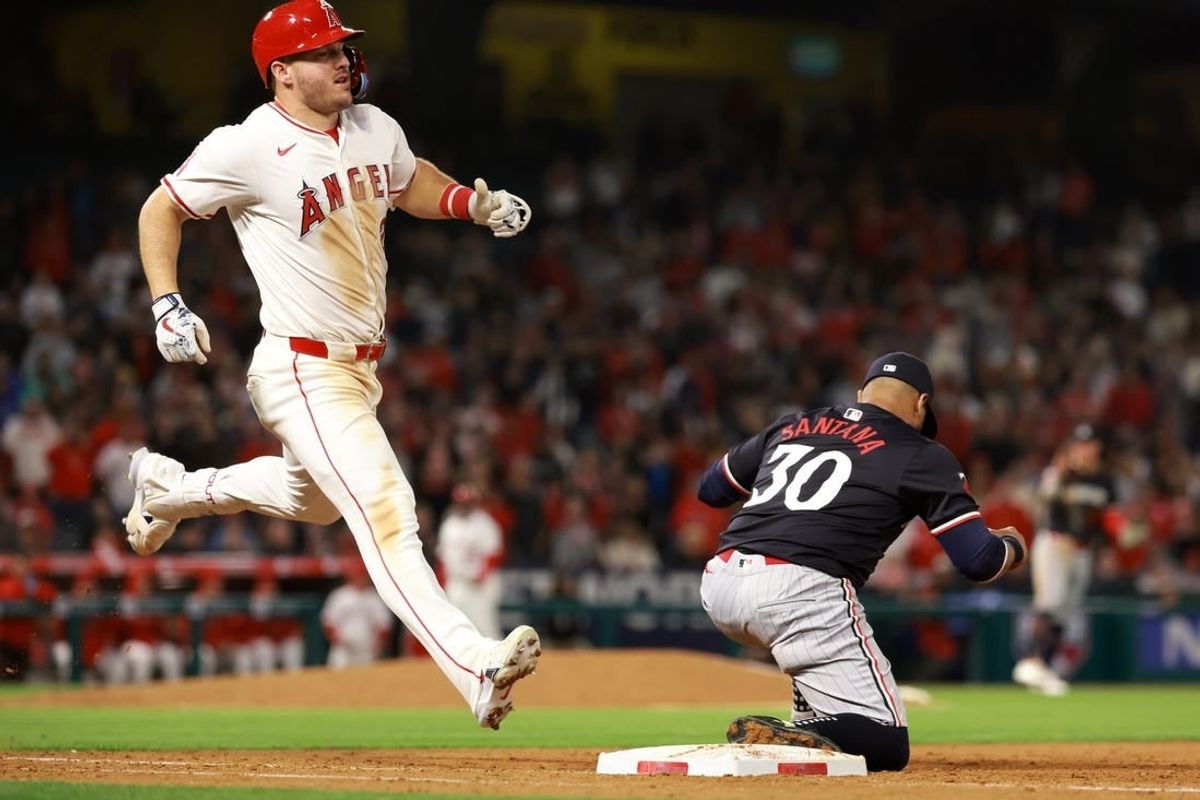 Apr 26, 2024; Anaheim, California, USA;  Los Angeles Angels outfielder Mike Trout (27) is out at first base to end the game against the Minnesota Twins at Angel Stadium.