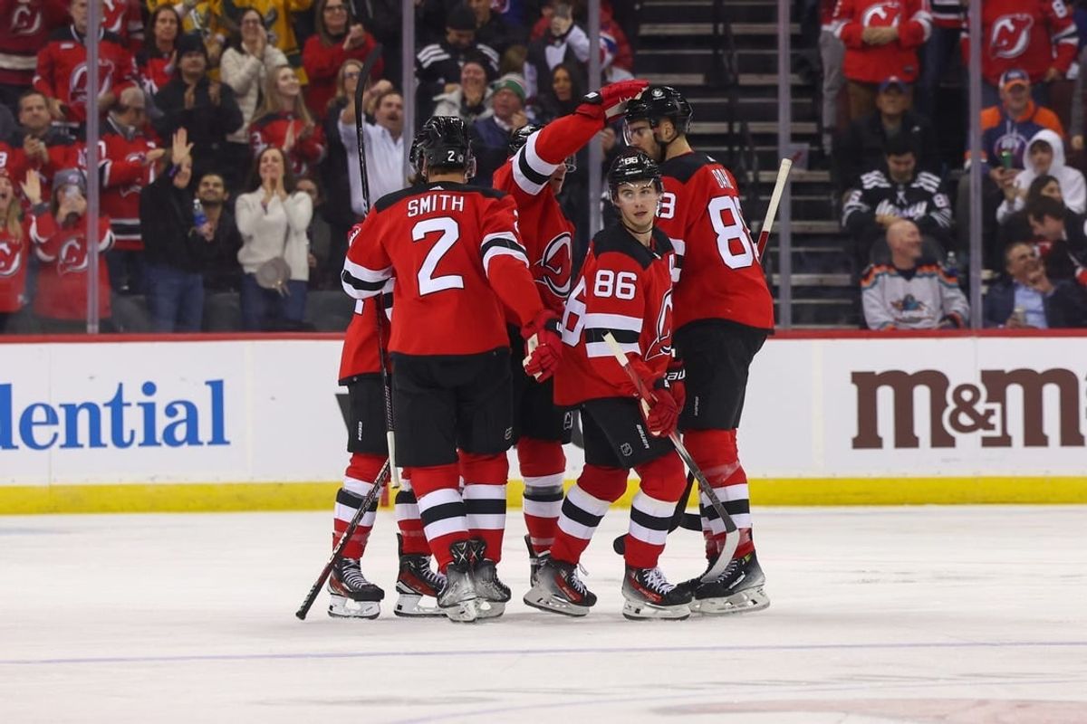 Nov 28, 2023; Newark, New Jersey, USA; New Jersey Devils center Jack Hughes (86) celebrates his goal against the New York Islanders during the third period at Prudential Center.