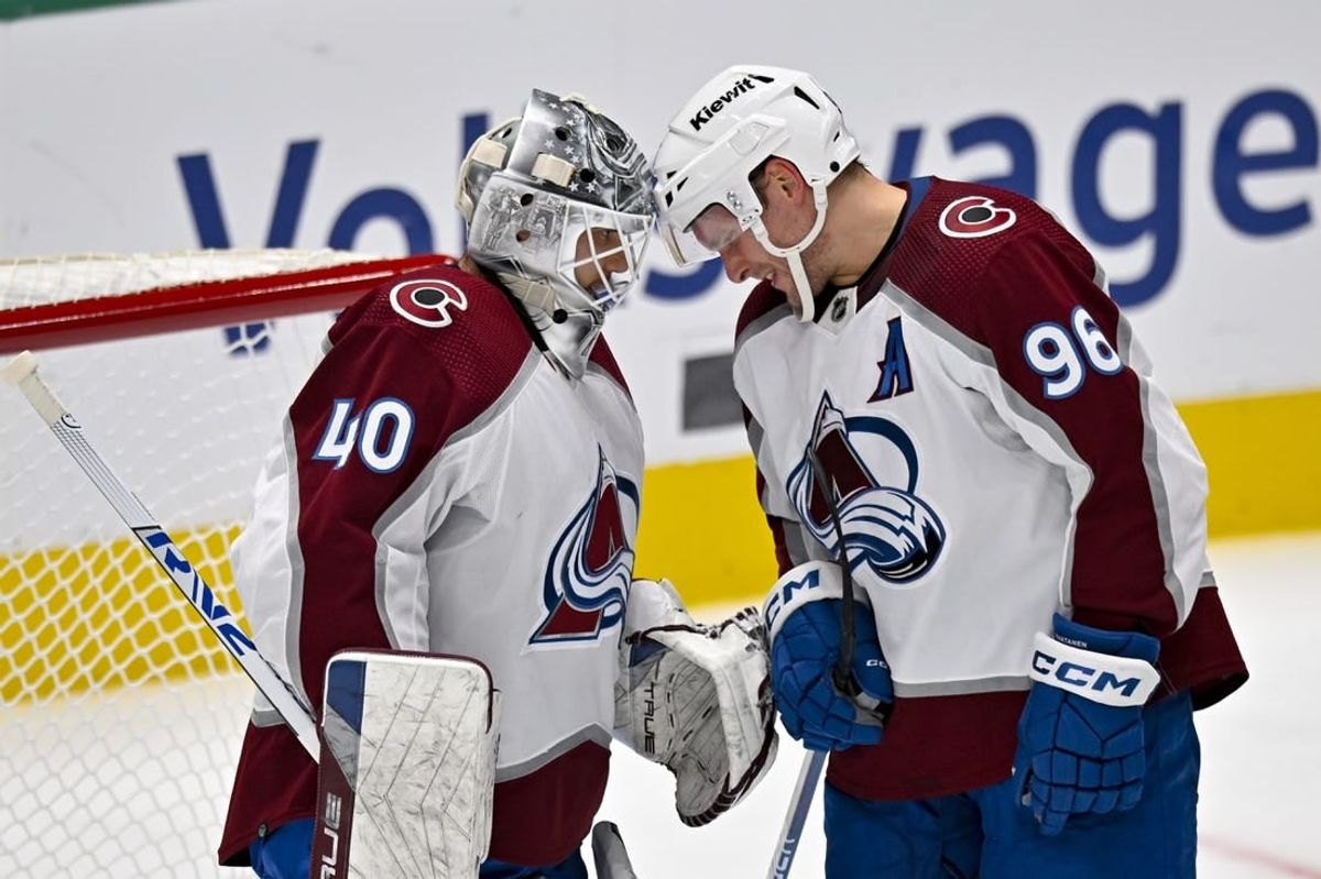 Nov 18, 2023; Dallas, Texas, USA; Colorado Avalanche right wing Mikko Rantanen (96) and goaltender Alexandar Georgiev (40) celebrate after the Avalanche victory over the Dallas Stars at the American Airlines Center.