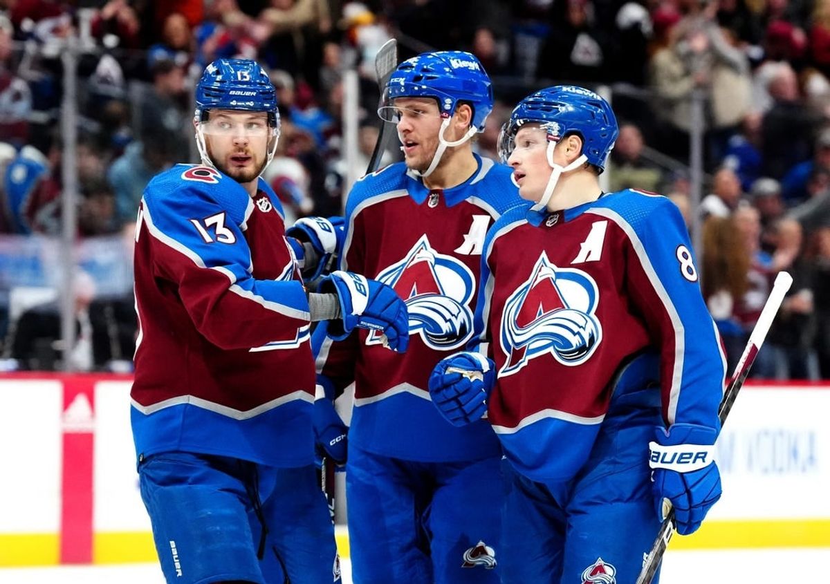 Nov 27, 2023; Denver, Colorado, USA; Colorado Avalanche defenseman Cale Makar (8) celebrates his goal with right wing Mikko Rantanen (96) and right wing Valeri Nichushkin (13) in the second period at Ball Arena.