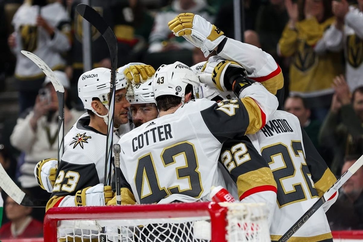 Mar 30, 2024; Saint Paul, Minnesota, USA; Vegas Golden Knights right wing Michael Amadio (22) celebrates his goal with teammates against the Minnesota Wild during the third period at Xcel Energy Center.