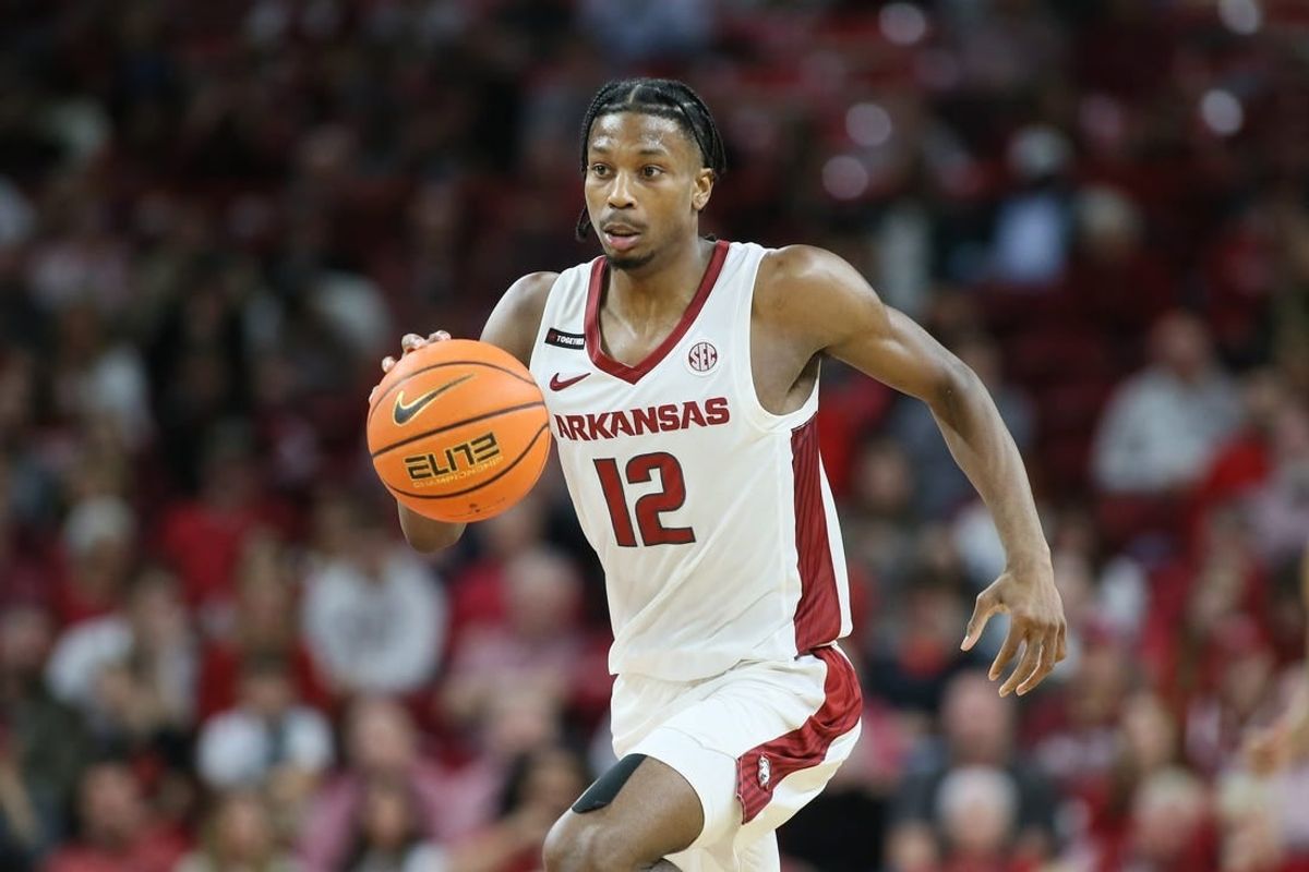 Dec 21, 2023; Fayetteville, Arkansas, USA; Arkansas Razorbacks guard Tramon Mark (12) dribbles in the second half against the Abilene Christian Wildcats at Bud Walton Arena. Arkansas won 83-73.