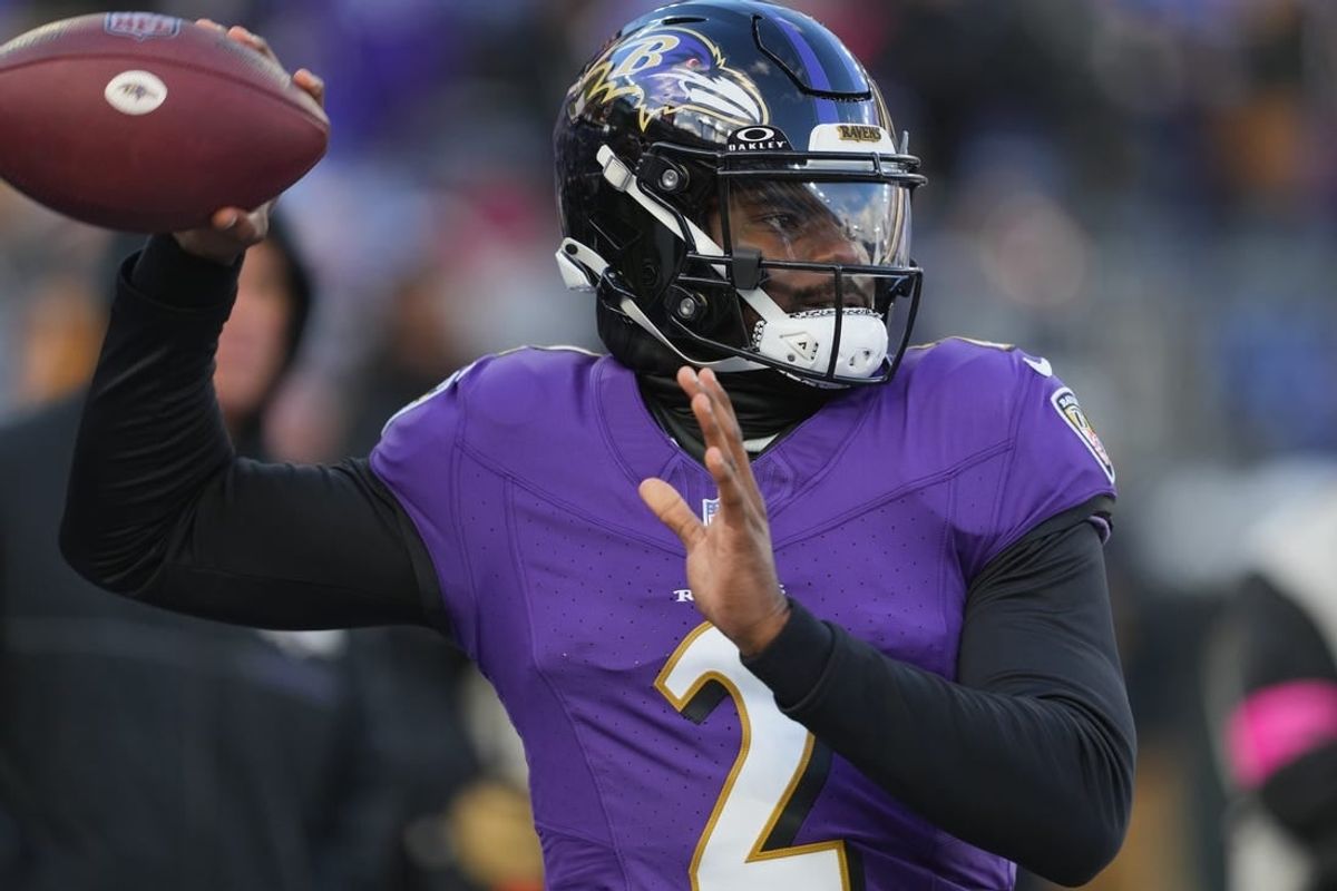 Jan 20, 2024; Baltimore, MD, USA; Baltimore Ravens quarterback Tyler Huntley (2) warms up before a 2024 AFC divisional round game against the Houston Texans at M&T Bank Stadium.