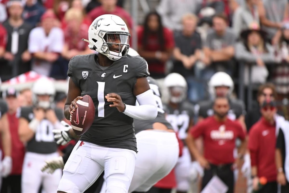 Sep 23, 2023; Pullman, Washington, USA; Washington State Cougars quarterback Cameron Ward (1) throws a pass against the Oregon State Beavers in the first half at Gesa Field at Martin Stadium.